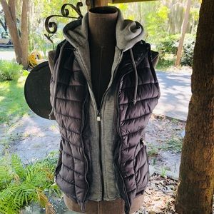YMI puffer vest with sweatshirt detail and hood.